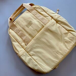 NWOT - Calpak Connect Laptop Backpack in Sunshine Yellow / Pastel Butter Yellow